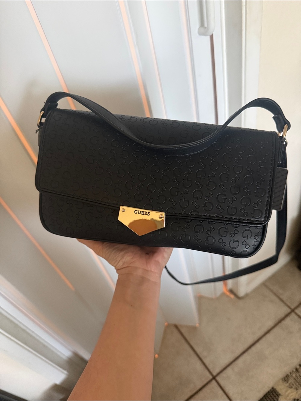 GUESS Black Embossed Logo Shoulder Bag with Gold Accent